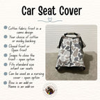 A car seat cover with a gray, white, and beige camouflage pattern, displayed on a baby car seat. The image includes a text list of features on the left and a logo at the bottom, all on a light beige textured background. Baby Car Seat Canopy Cover Camo - The Creative Raccoon