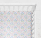 cotton fitted crib sheet featuring a delicate blue hydrangea bouquet accented by a pink bow
Blue Hydrangea Pink Bow Crib Sheet - The Creative Raccoon