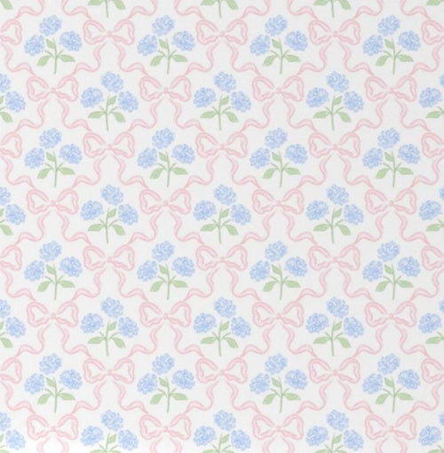 cotton fitted crib sheet featuring a delicate blue hydrangea bouquet accented by a pink bow
Blue Hydrangea Pink Bow Crib Sheet - The Creative Raccoon