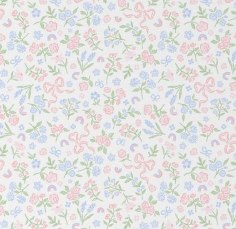 Pastel floral and bow pattern on a white background.
Bow Crib Sheet - The Creative Raccoon
