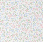 Pastel floral and bow pattern on a white background.
Bow Crib Sheet - The Creative Raccoon