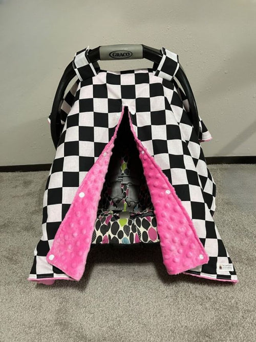 Black and white checkered car seat cover with pink interior. Car Seat Canopy Checkered - The Creative Raccoon