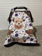 Car seat cover with highland cow design on a neutral background. Car Seat Canopy Highland Cows - The Creative Raccoon