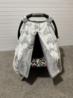 Car seat cover with tractor pattern on a plain background. Car Seat Canopy Tractors - The Creative Raccoon