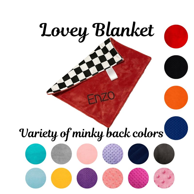 A red plush lovey blanket with a black-and-white checkered corner and the name 'Enzo' embroidered on it. Checkered Lovey Blanket - The Creative Raccoon 