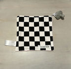 Checkered paci blanket with satin ribbon loop and elastic loop for a pacifier. 
Softest Minky Security Lovey - The Creative Raccoon