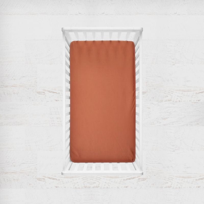 spice orange crib sheet - the creative raccoon